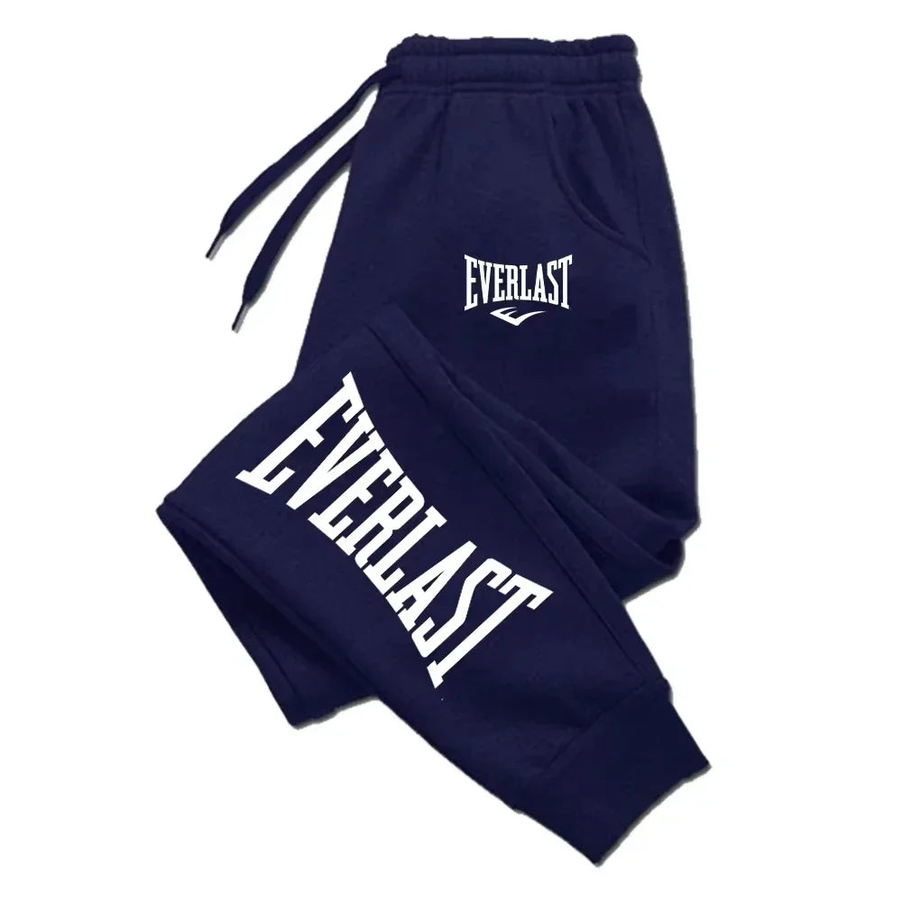 Navy blue sweatpants with 'Everlast' branding on a white background